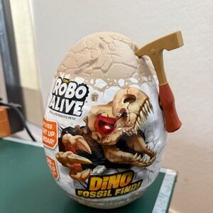 Robo Alive Dino Fossil Find Surprise Robotic Egg Toy, New